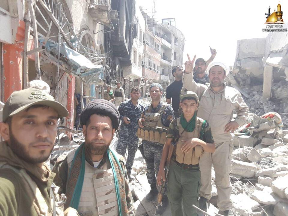 تقرير مصور من أزقة “السرجخانة” الضيقة في الموصل لمبلغي لجنة الإرشاد وهم ينقلون بأمانة سلام ودعاء المرجعية وتوصياتها للأبطال في الشرطة الاتحادية والرد السريع 